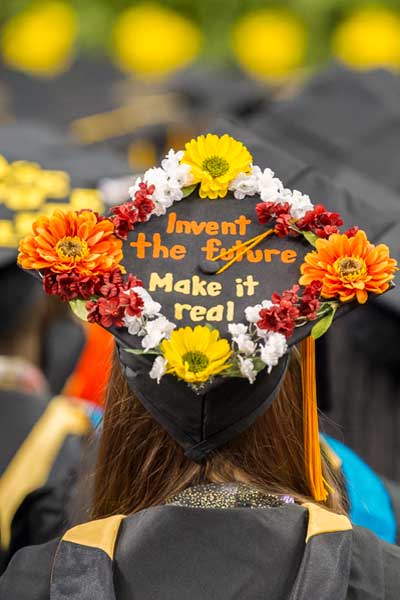 v.c.u. graduates with their graduation caps at the commencement