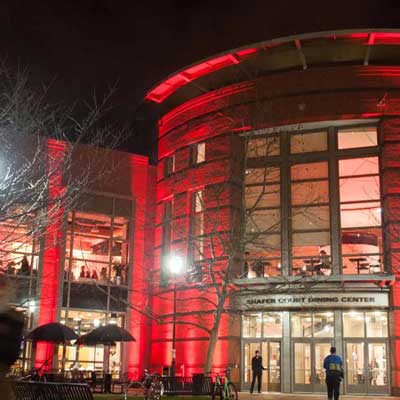 v.c.u. shafer court dining center at night lit up by a red light in celebration of chinese new years