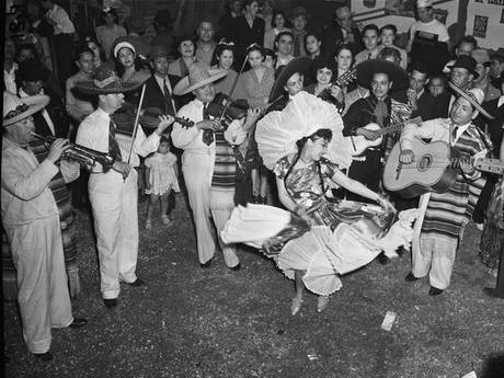 historic photo of a woman dancing in celebration of Hispanic Heritage Month